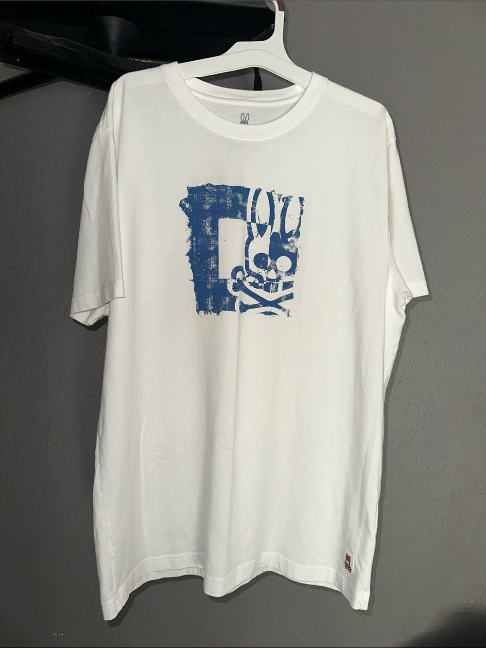 Psycho Bunny White Short Sleeve Tee with Distressed Blue Bunny Graphic